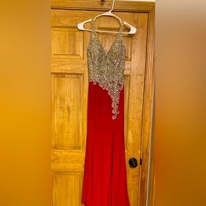 This is a beautiful red let’s dress with a slit.